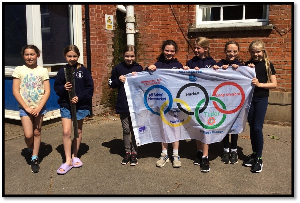 Children with Olympic flag.